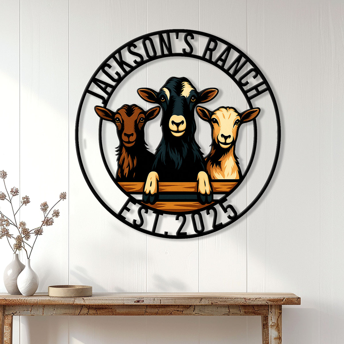 Goat ranch wall decor displayed on a white paneled wall above a rustic entryway table