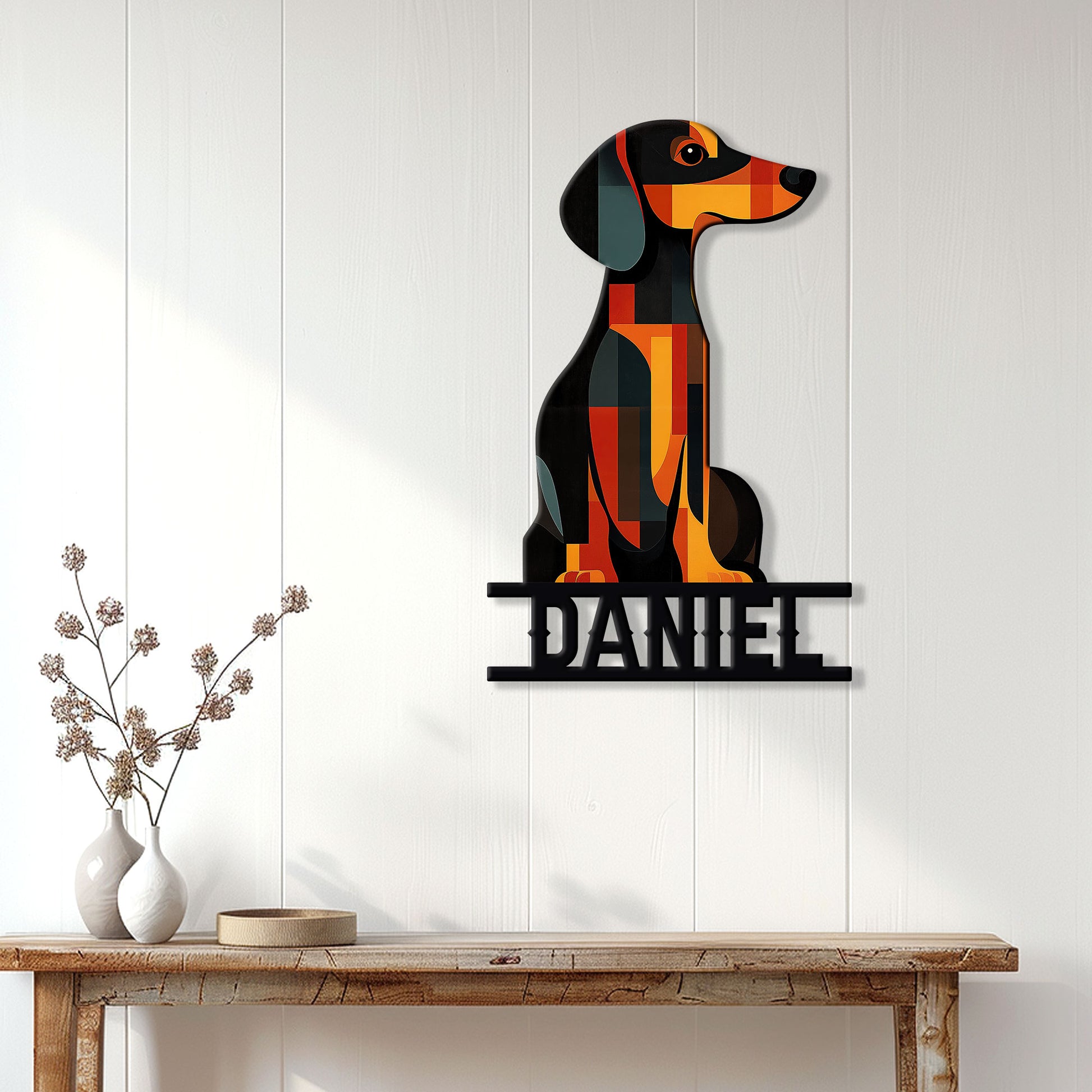 Geometric dachshund wall sign displayed on a light paneled wall above a console table
