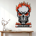 Flaming skull wall sign displayed above a console table in a bright modern room