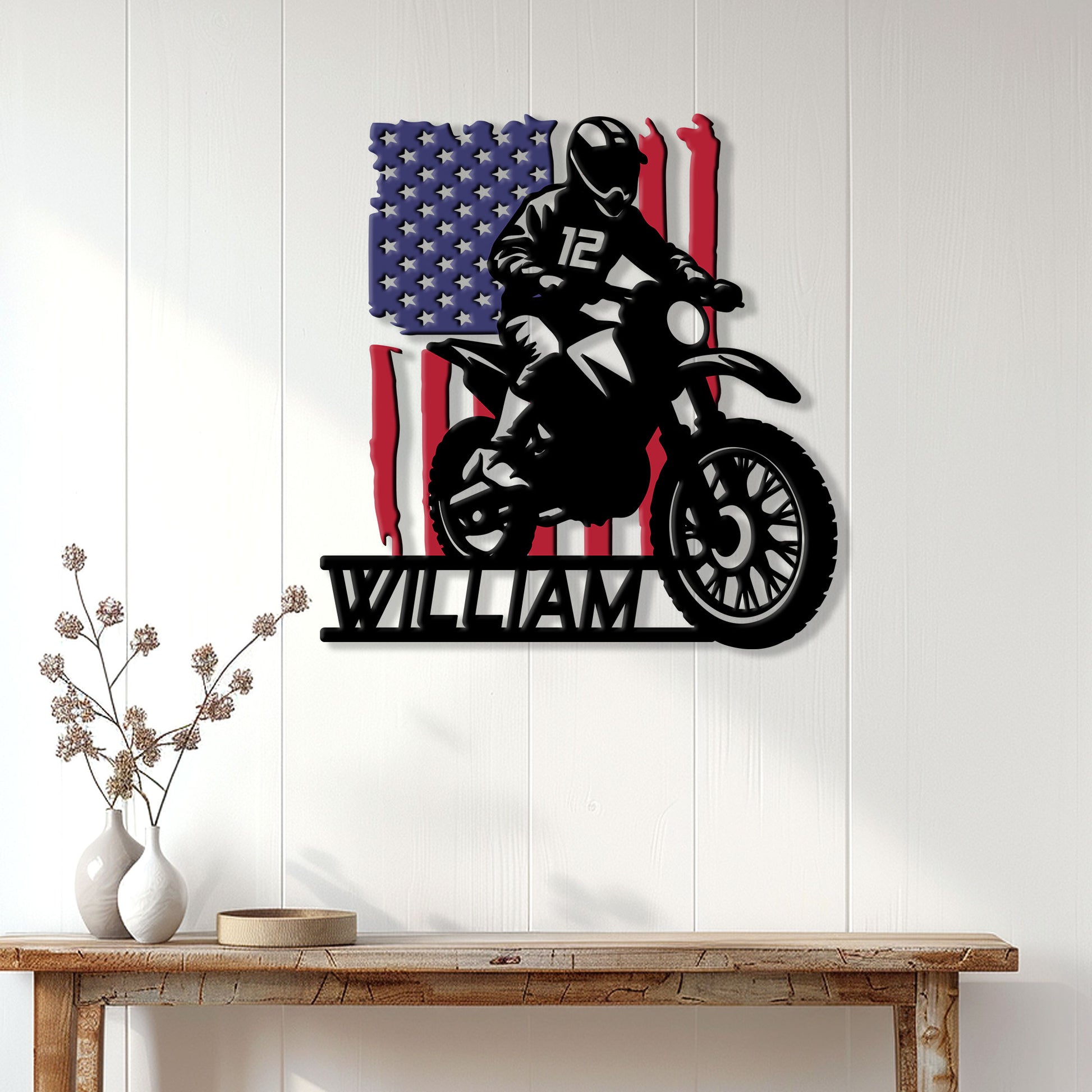 Motocross rider metal wall sign displayed on white-paneled home decor wall