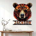 Colorful bear wall sign displayed above a console table in a bright modern home interior