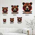 Bear metal sign shown in multiple size options on a light paneled wall above a sofa