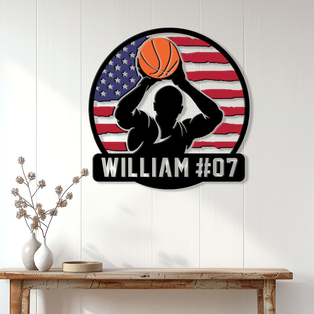 Basketball player silhouette metal wall sign displayed on a bright paneled wall above a console table