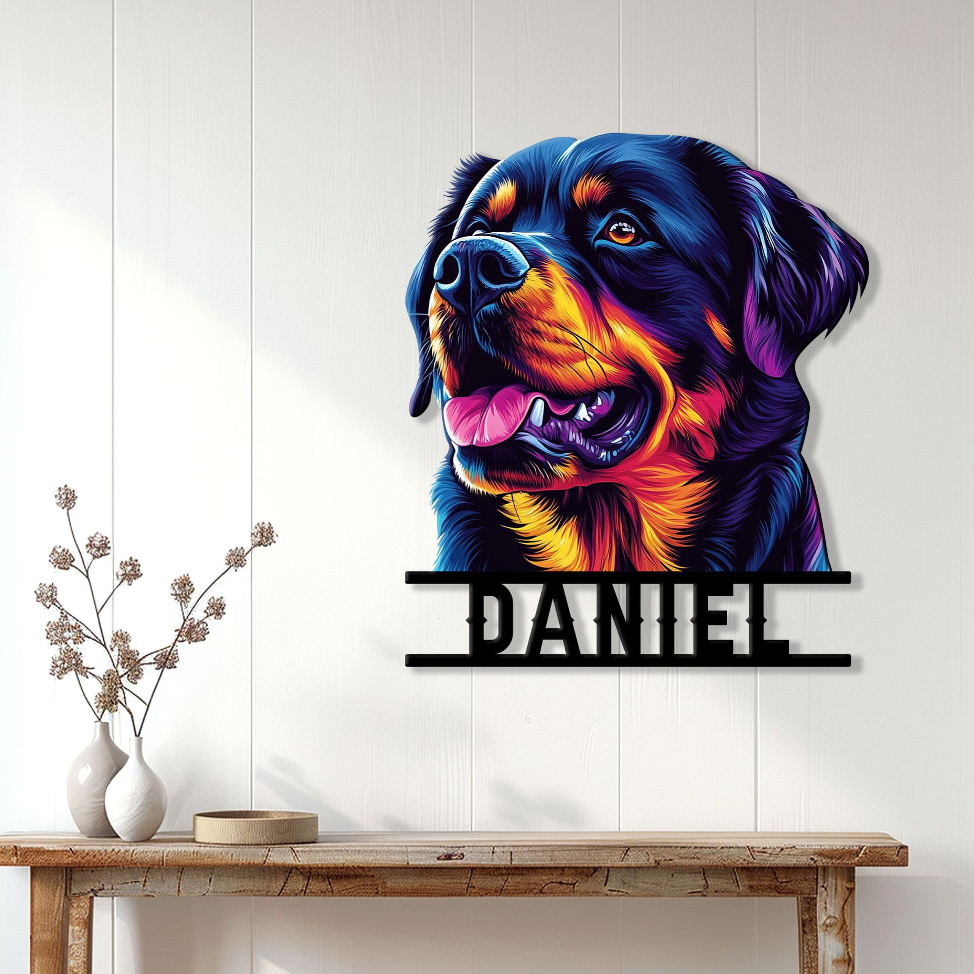 Colorful Rottweiler metal sign displayed on a light wood-paneled wall above a console table