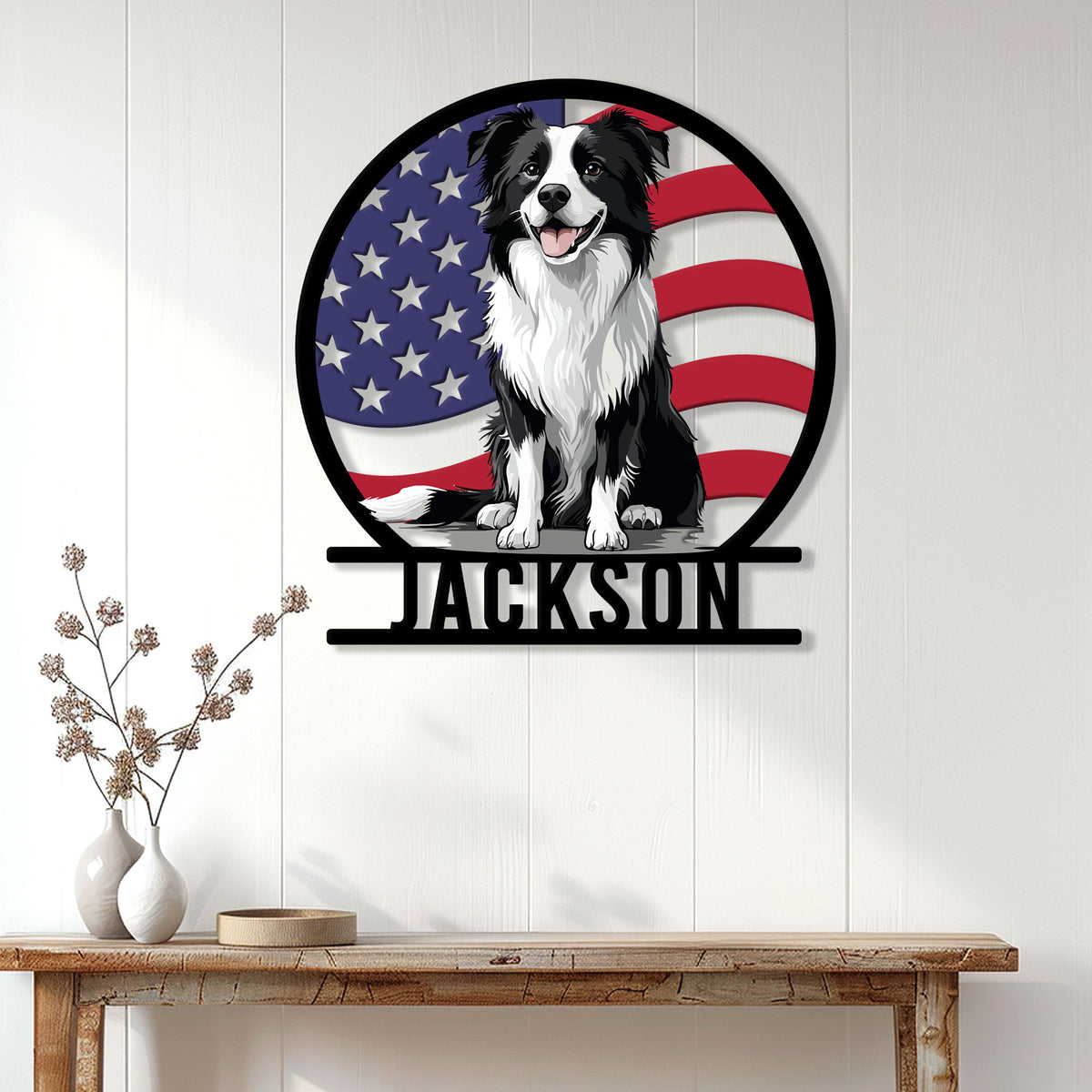 Patriotic Border Collie wall sign displayed on a light wood-paneled wall above a console table