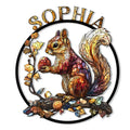 Stained glass style squirrel metal sign with an acorn, autumn leaves, and a large curved tail
