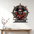 Pirate metal wall sign displayed in a bright home entryway, featuring a skull captain and ship wheel