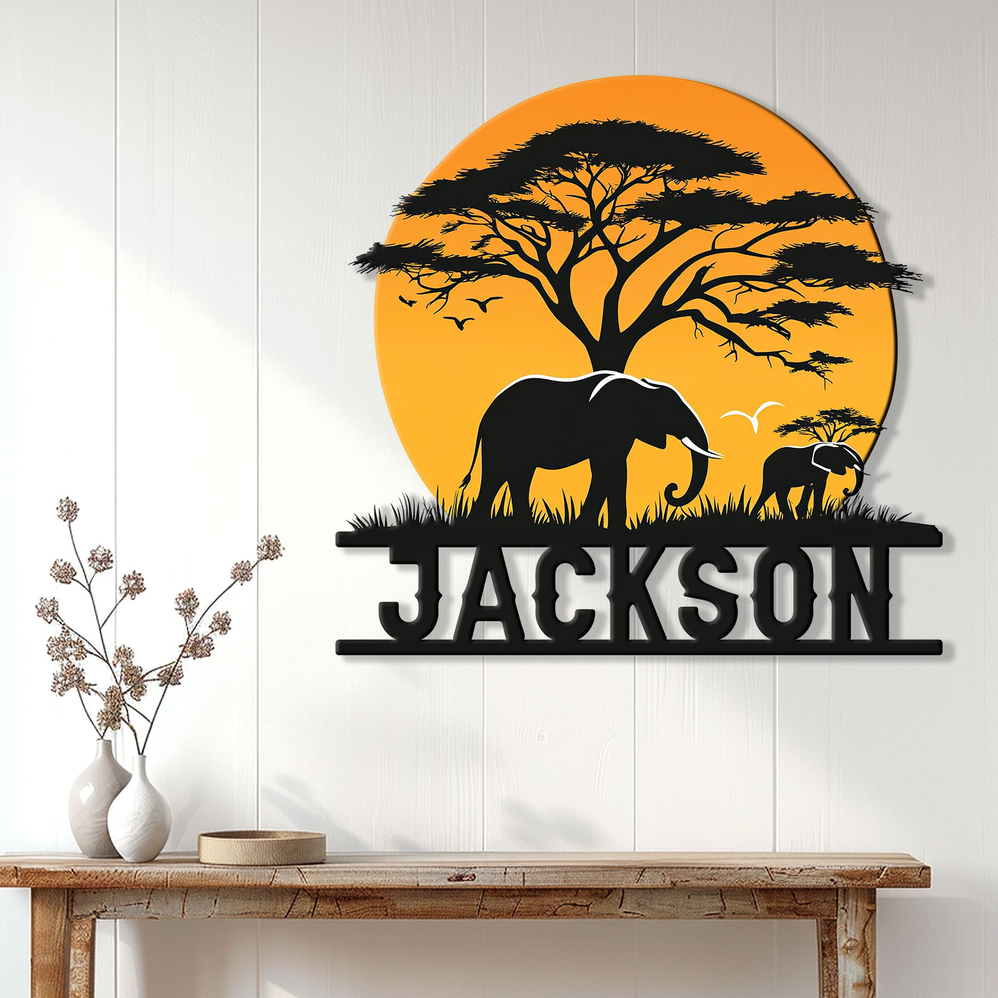 Elephant safari wall decor displayed above a console table in a bright modern home