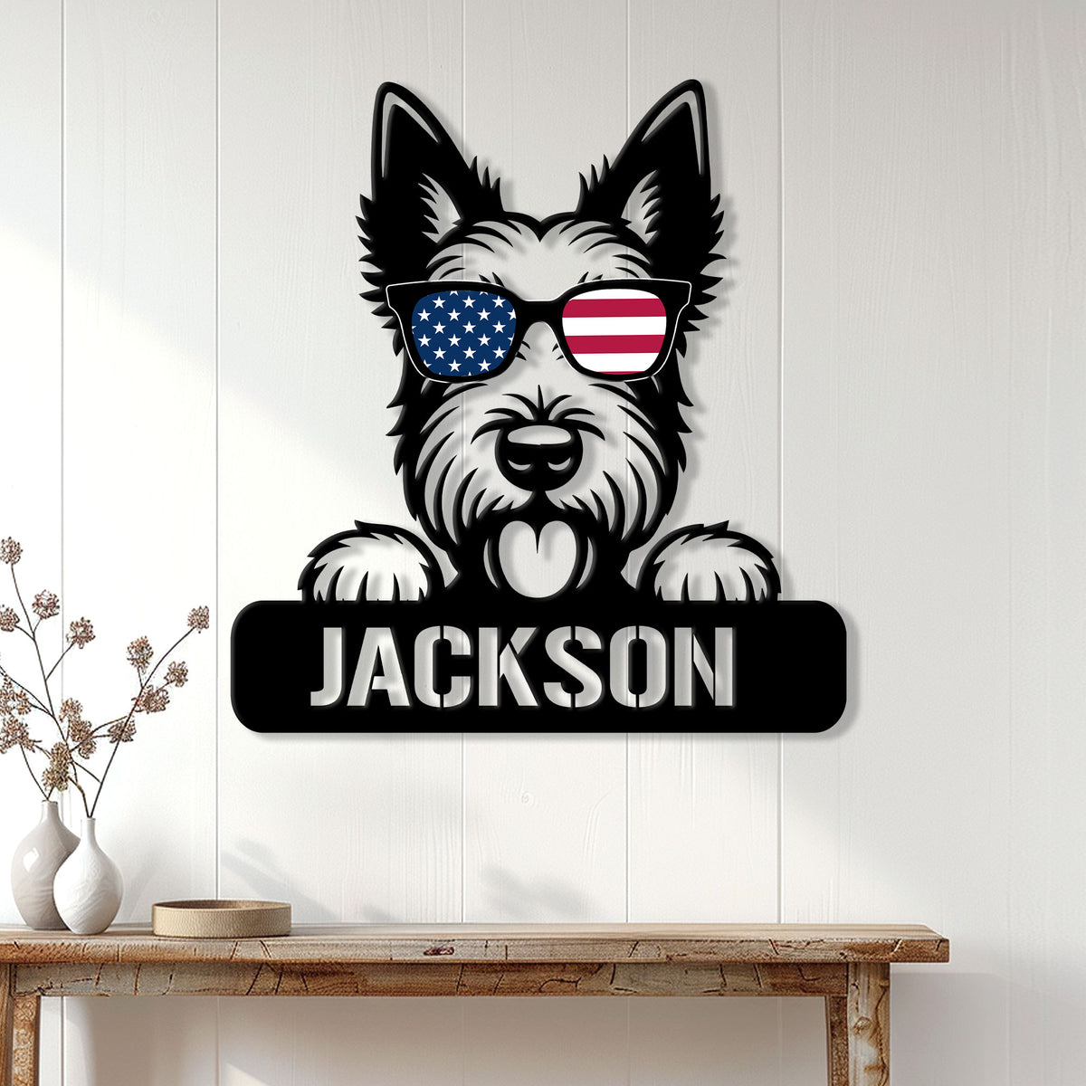 Patriotic Scottish Terrier metal sign displayed on a light wood wall above a console table