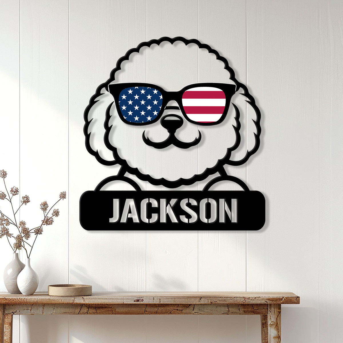 Bichon Frise metal wall sign displayed on a white paneled wall above a console table