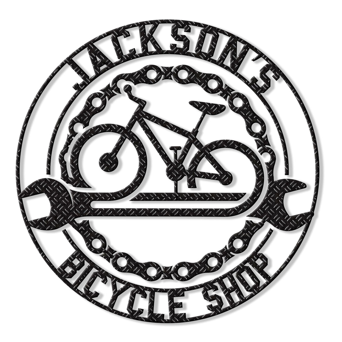 Round cyclist metal sign featuring a bicycle silhouette, crossed wrenches, chain accents, and bold bike shop styling