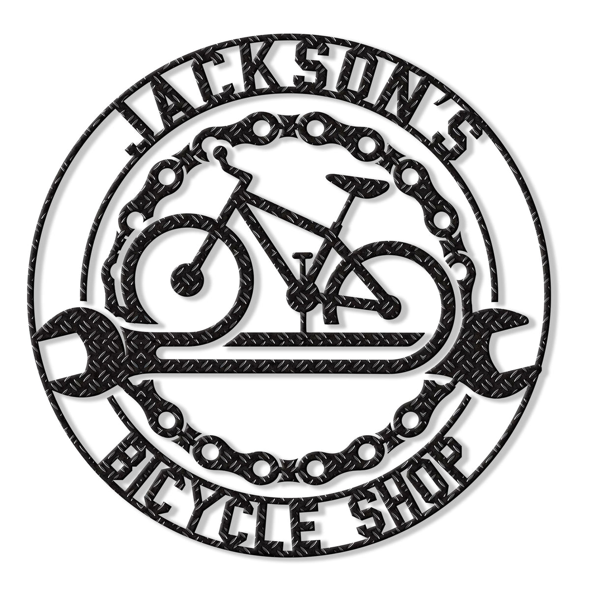 Round cyclist metal sign featuring a bicycle silhouette, crossed wrenches, chain accents, and bold bike shop styling