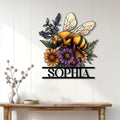 Bee flower metal sign displayed on a light wood-paneled wall above a console table
