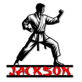Close-up karate metal sign featuring a martial artist in a powerful defensive stance