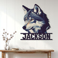 Wolf metal sign displayed on a light paneled wall above a wooden console table