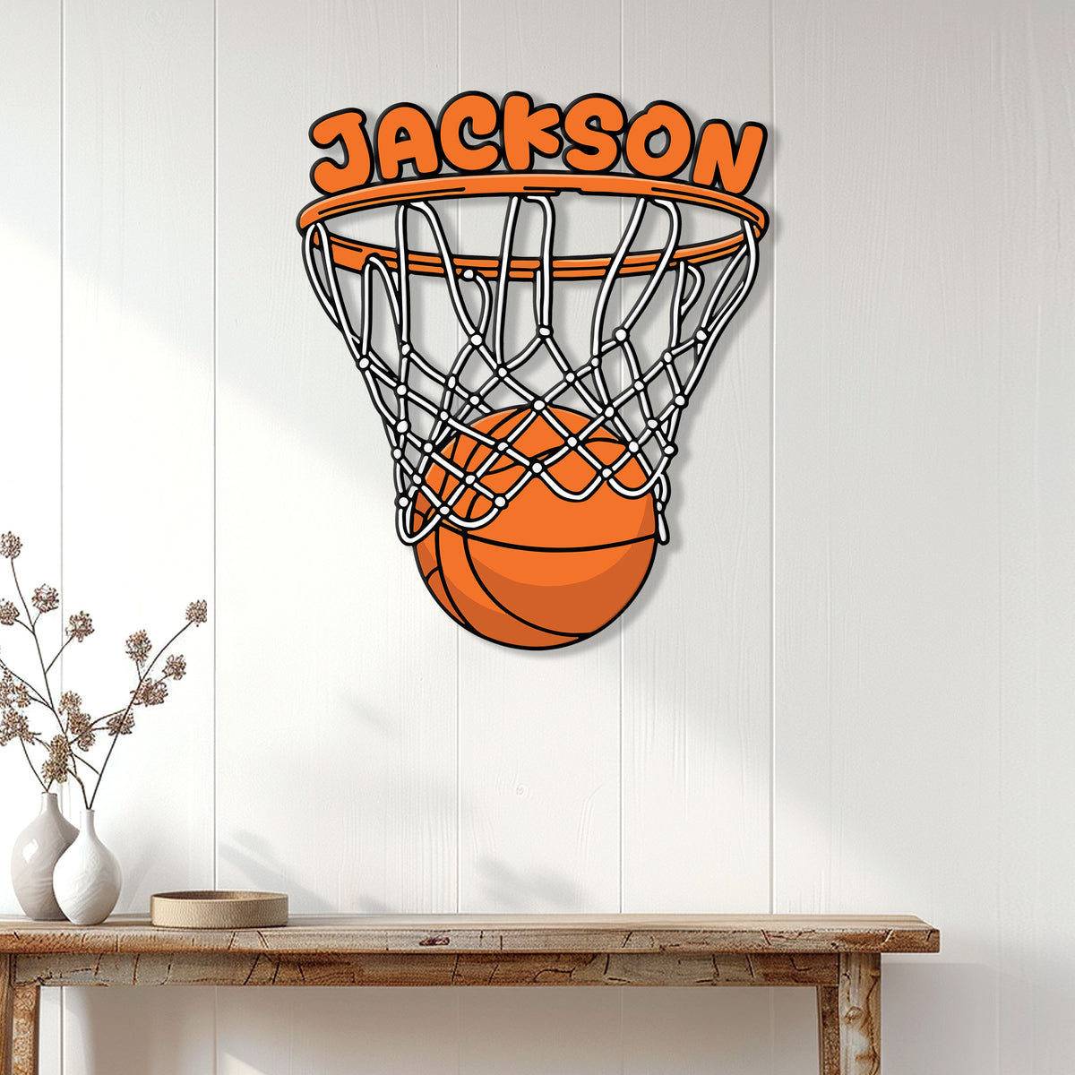 Basketball metal wall sign displayed on a light paneled wall above a console table