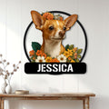 Floral Chihuahua wall sign displayed on a bright white paneled wall above a wooden console table