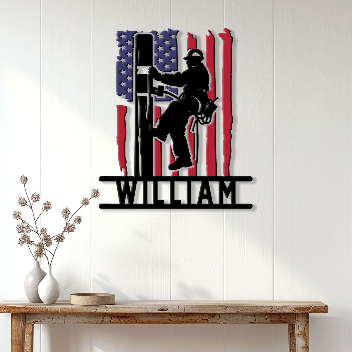 Lineman wall sign displayed on a light wood wall above a console table in a home setting