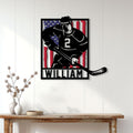 Patriotic hockey metal sign displayed as wall decor above a console table in a bright home interior