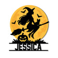 Halloween metal sign featuring a witch and cat flying past a full moon with bats and a jack-o'-lantern