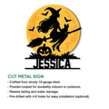 Cut metal Halloween sign showing a witch on a broom, black cat, bats, pumpkin, and glowing moon