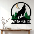 Howling wolf wall sign displayed on a white paneled wall above a rustic console table