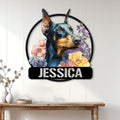 Floral Doberman metal sign displayed on a bright paneled wall above a console table