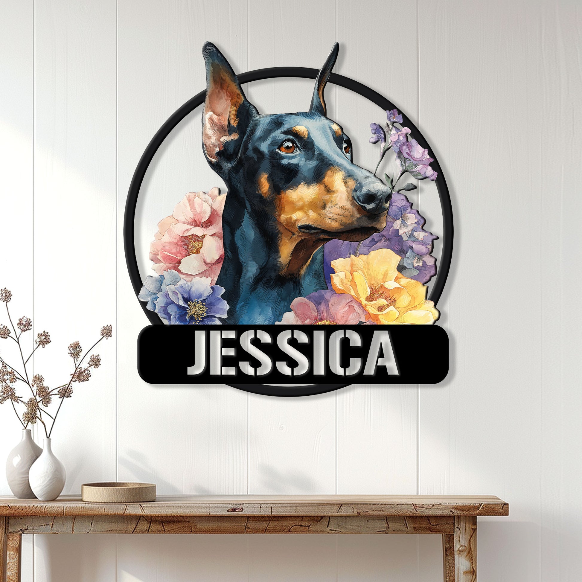 Floral Doberman metal sign displayed on a bright paneled wall above a console table