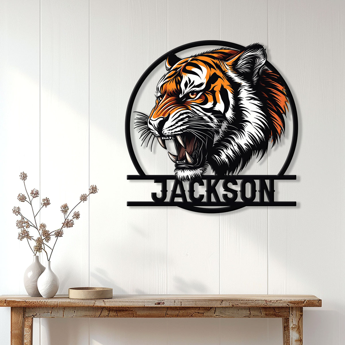 Tiger metal wall sign displayed above a wooden console in a bright contemporary home
