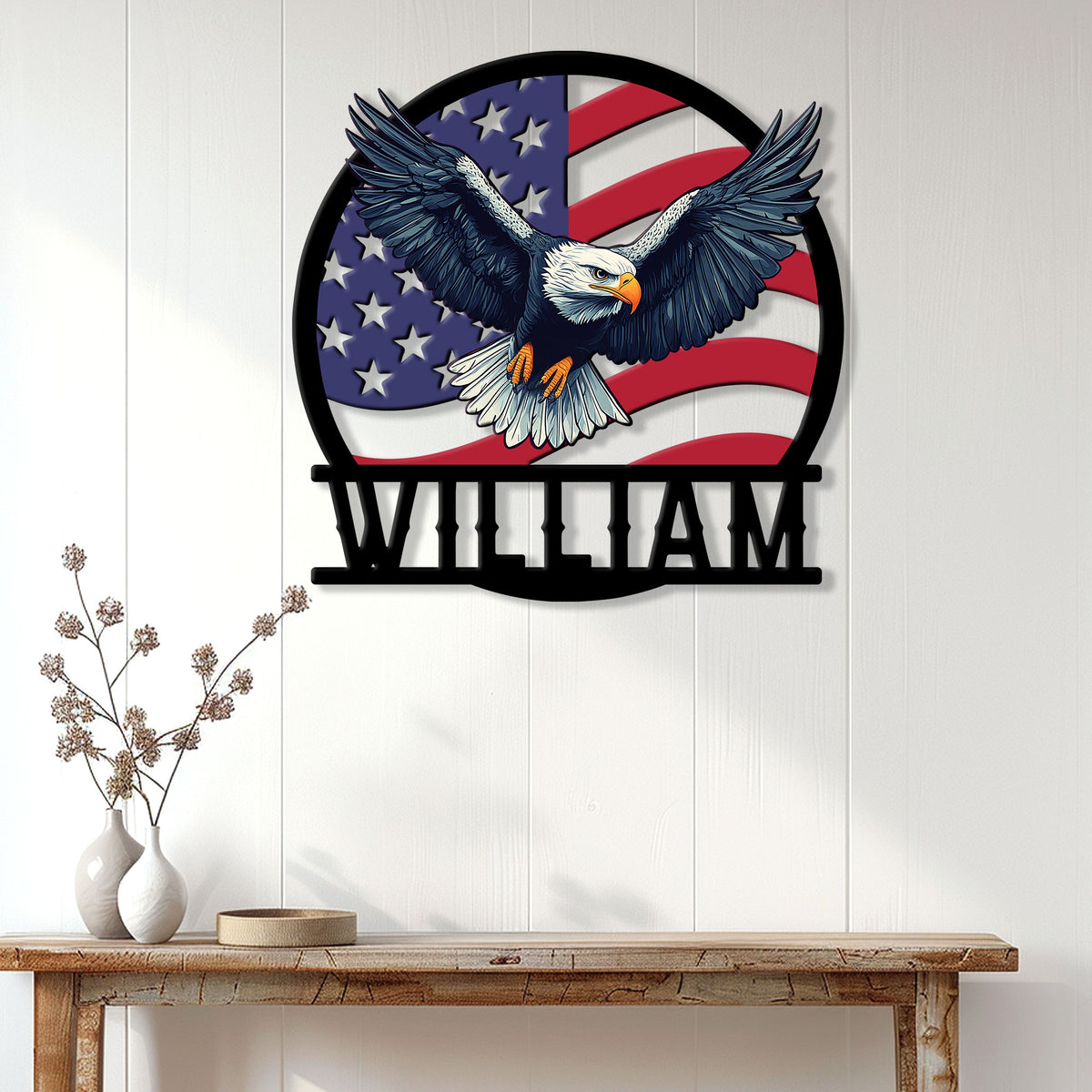 American eagle metal wall sign displayed above a console table in a bright home interior