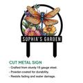 Cut metal dragonfly garden sign featuring bright floral artwork and a decorative circular silhouette