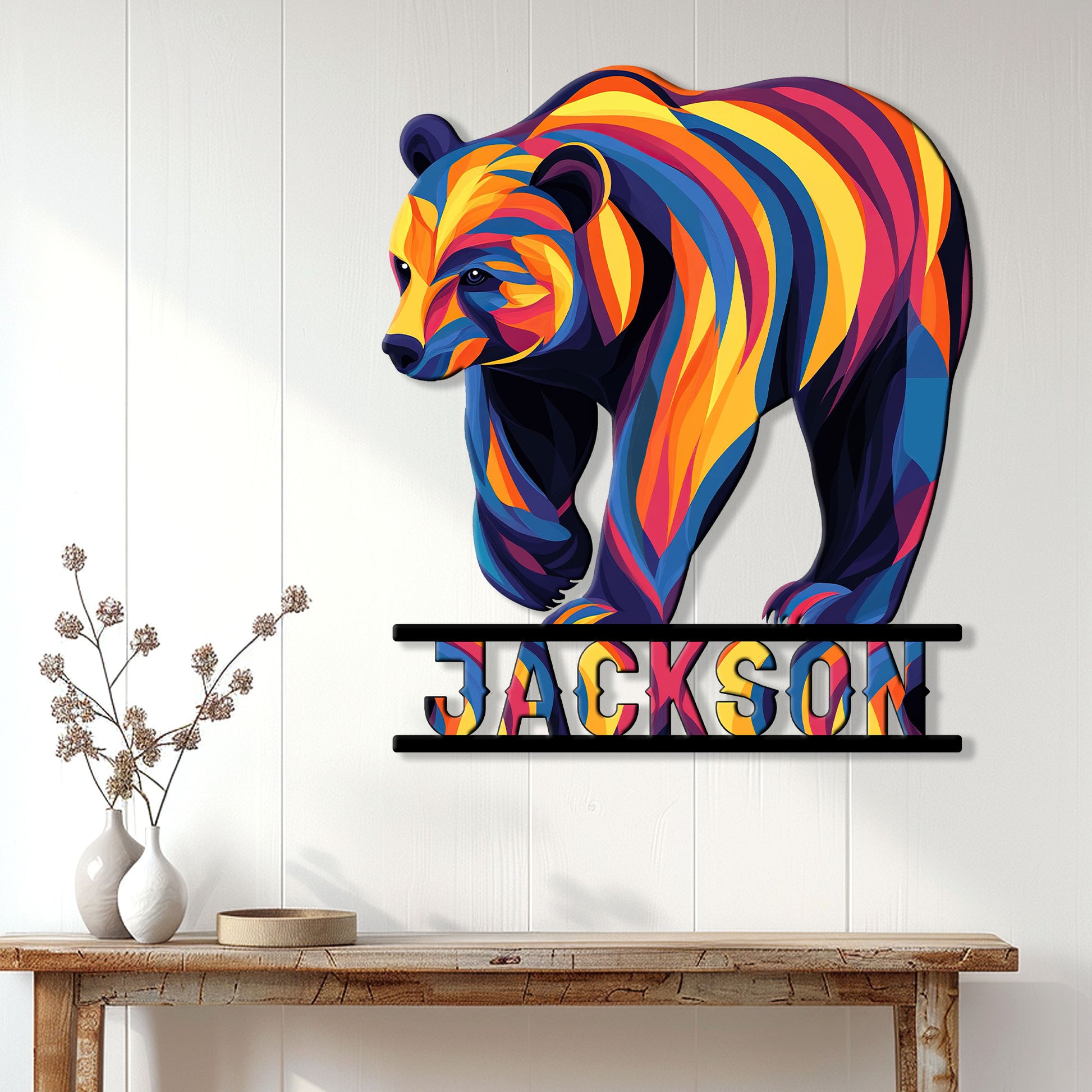 Multicolor bear metal sign displayed as vibrant wall decor above a wood console table
