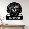 Patriotic Boykin Spaniel metal sign displayed on a white paneled wall above a console table