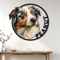 Circular Australian Shepherd metal sign displayed on a bright farmhouse-style entryway wall