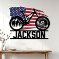 American flag cyclist metal sign displayed as wall decor above a console table in a bright home
