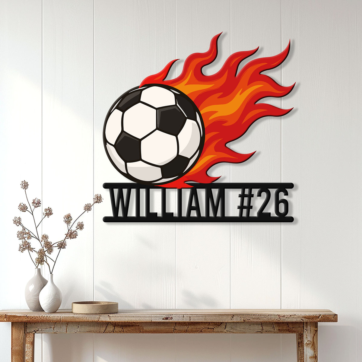 Flaming soccer ball metal sign displayed as energetic wall decor in a bright modern home