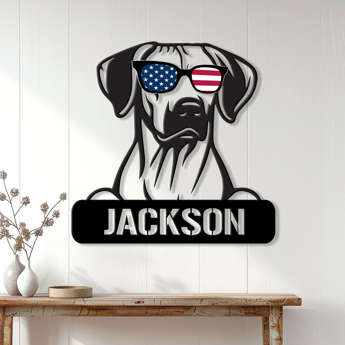 Patriotic dog wall sign displayed on a white paneled wall above a console table