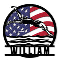 Patriotic swimming metal sign featuring a freestyle swimmer silhouette over American flag colors and flowing waves