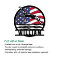 Cut metal swimming sign with a dynamic swimmer silhouette, patriotic flag design, and wave details