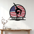 Gymnastics wall decor displayed on a light wood-paneled wall above a console table
