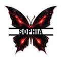 Close-up of a black butterfly metal sign with glowing red details and sculpted wing shapes