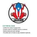 Close product view of a Puerto Rico frog metal sign with a bold circular cutout design