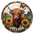 Stained glass style Highland cow metal sign surrounded by sunflowers, butterflies, and colorful floral scenery