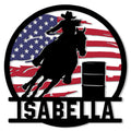 Rodeo metal sign featuring a cowboy riding a bucking horse against an American flag backdrop