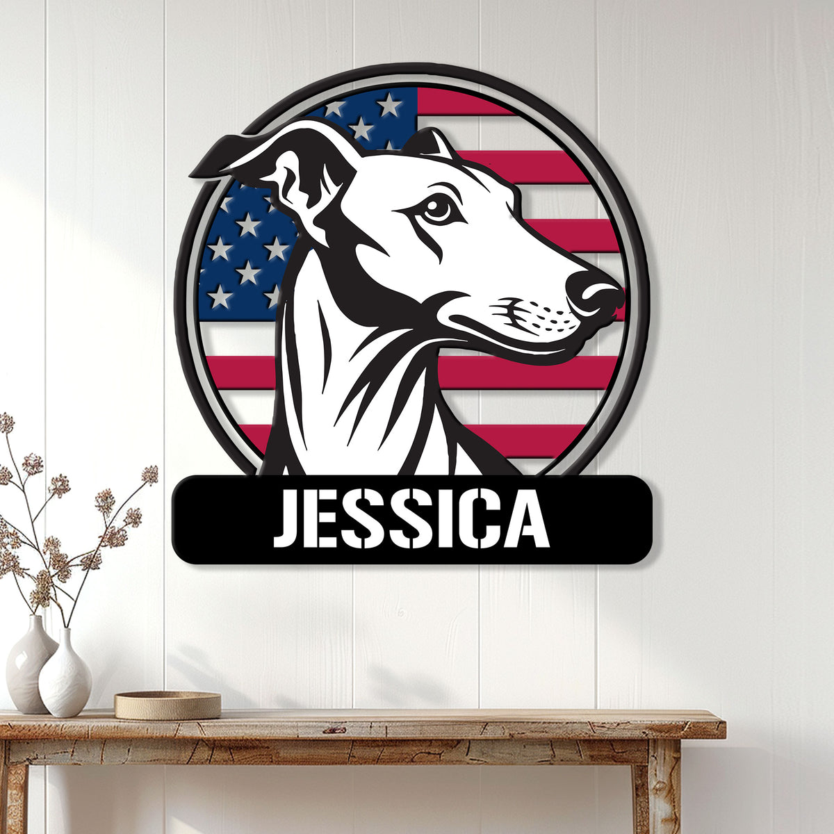 Patriotic greyhound wall sign displayed on a white wood wall above a console table