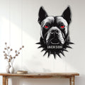 Spiked pitbull wall sign displayed in a bright home entryway above a rustic console table