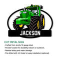 Green tractor metal sign shown with a product feature infographic and cut metal design