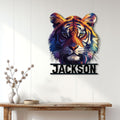 Colorful tiger metal sign displayed on a light paneled wall above a console table