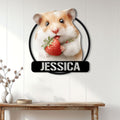 Hamster wall decor displayed on a white paneled wall above a rustic console table