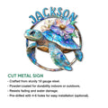 Sea turtle metal sign shown with a floral shell design and cut metal sign features